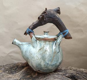 Tetera con mando de madera